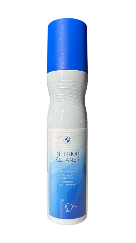 Blue and white interior cleaner spray bottle on a white background