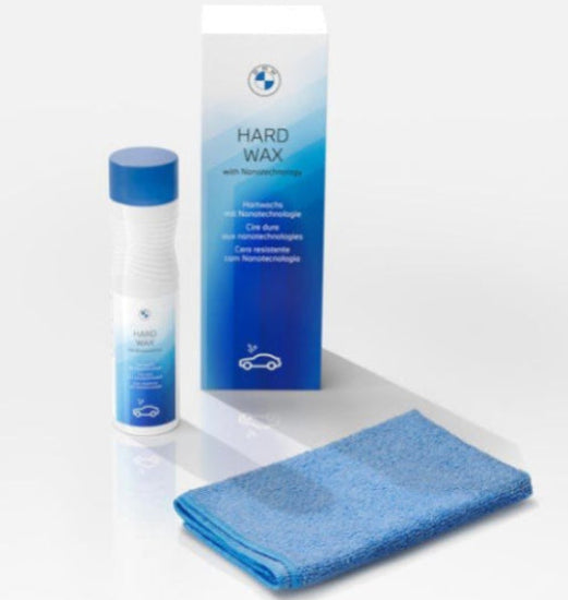 BMW hard wax with applicator and microfiber cloth on a white background