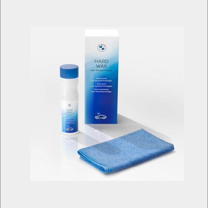 BMW hard wax with applicator and microfiber cloth on a white background